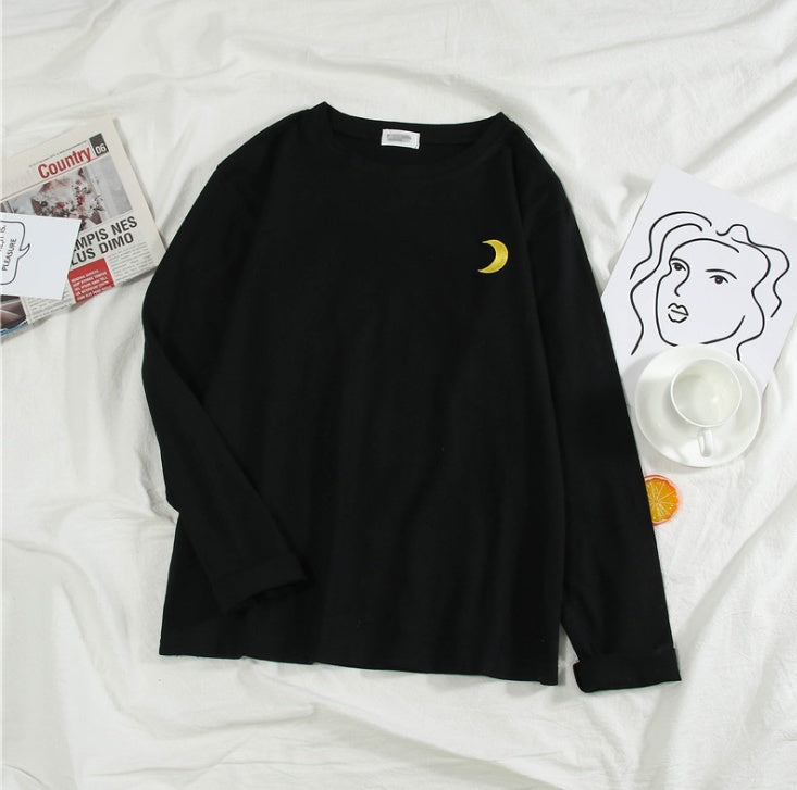 A super - sleeved black cec top for autumn